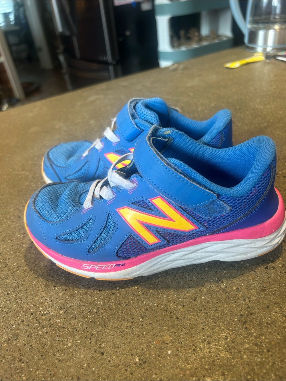 New Balance Kids Blue with Pink & Yellow Accent Athletic Sneakers